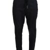 Dolce & Gabbana Jeans – Denim Tapered Pants with Logo Details Men – 46 IT