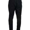 Dolce & Gabbana Jeans – Denim Tapered Pants with Logo Details Men – 46 IT